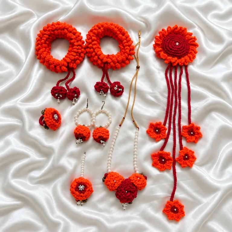 Crochet floral jewellery set with a pearl necklace, earrings and a ring
